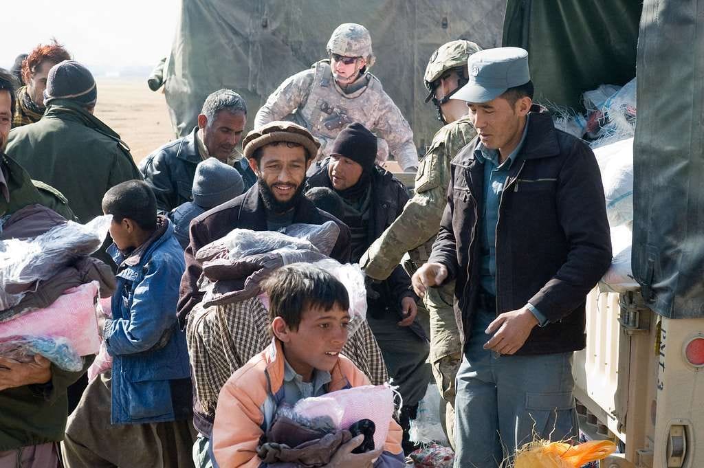 musahi villagers move through the humanitarian aid 52f0cf 10243245300232835556301