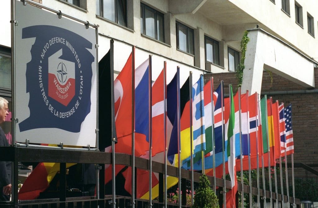 nato member nation flags fly at the entrance to the gromada hotel warsaw poland d3e297 10245039806013316254299